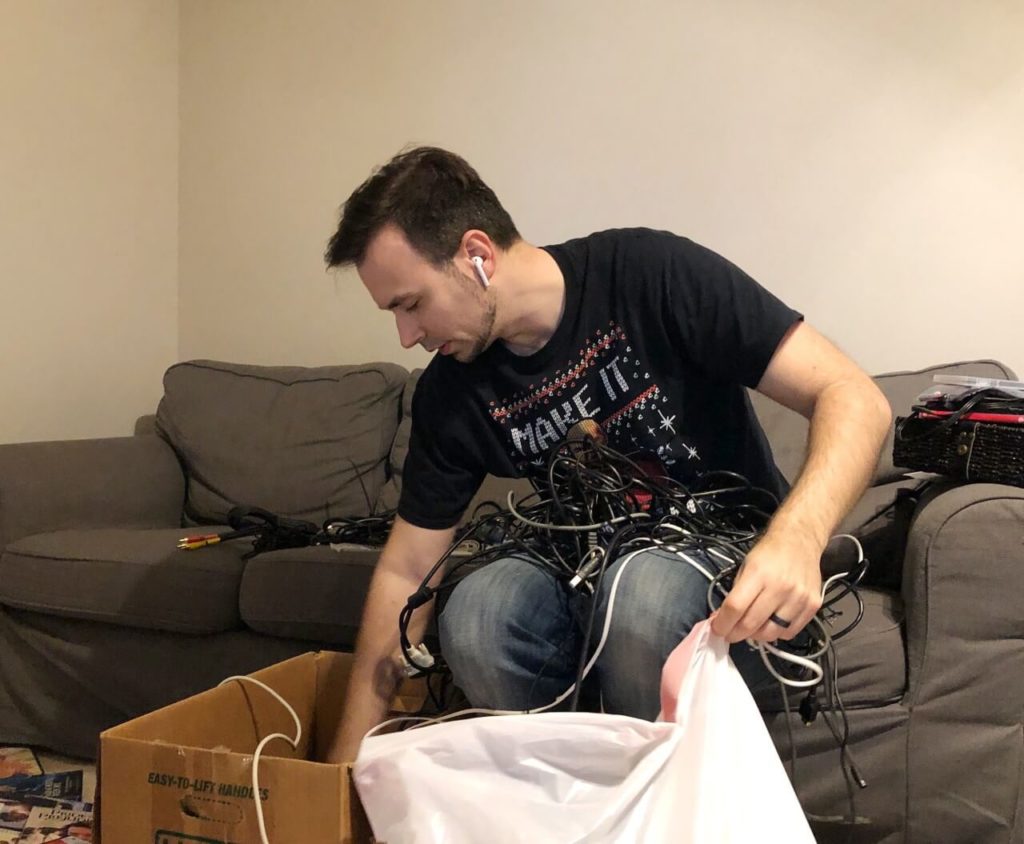 man sorting cables