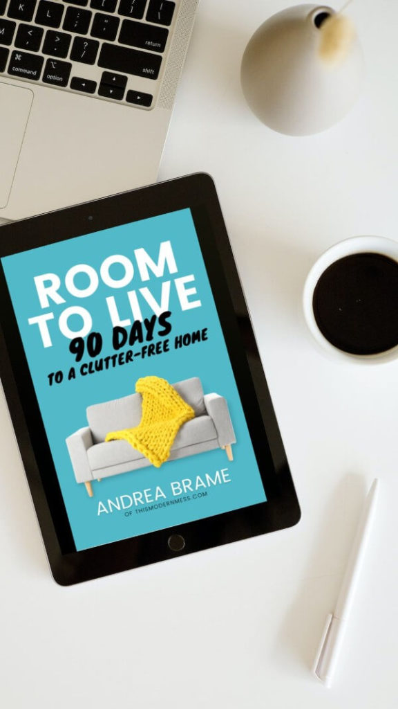 Room to Live ebook mockup on tablet with computer keyboard in background