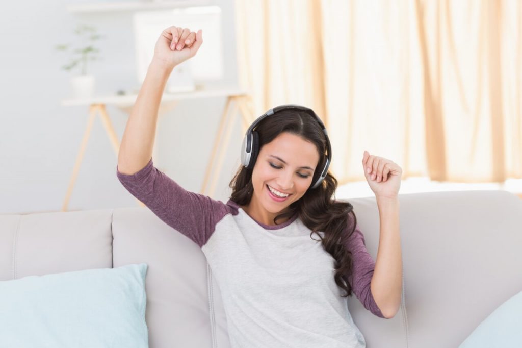 happy woman listening to music