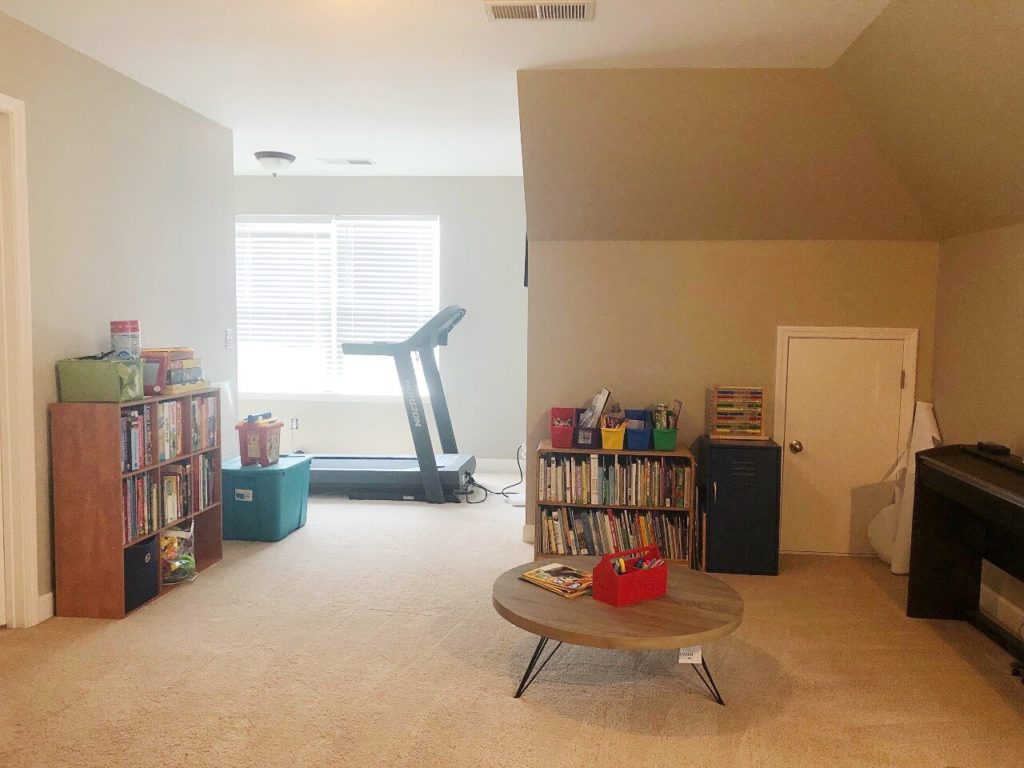 clean bonus room where staging area had been set up previously